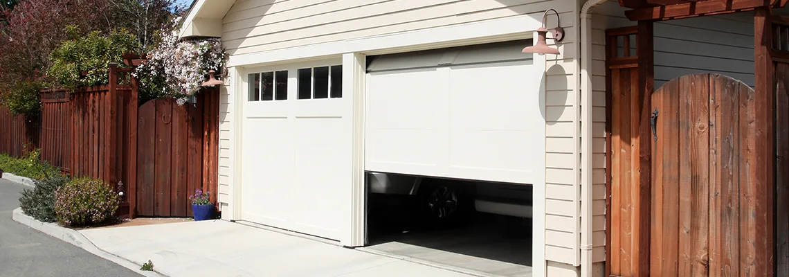 Fix Metal Garage Door Jerking in Panama City, Florida